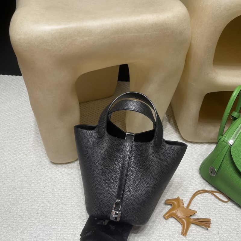 H**mes shopping bags